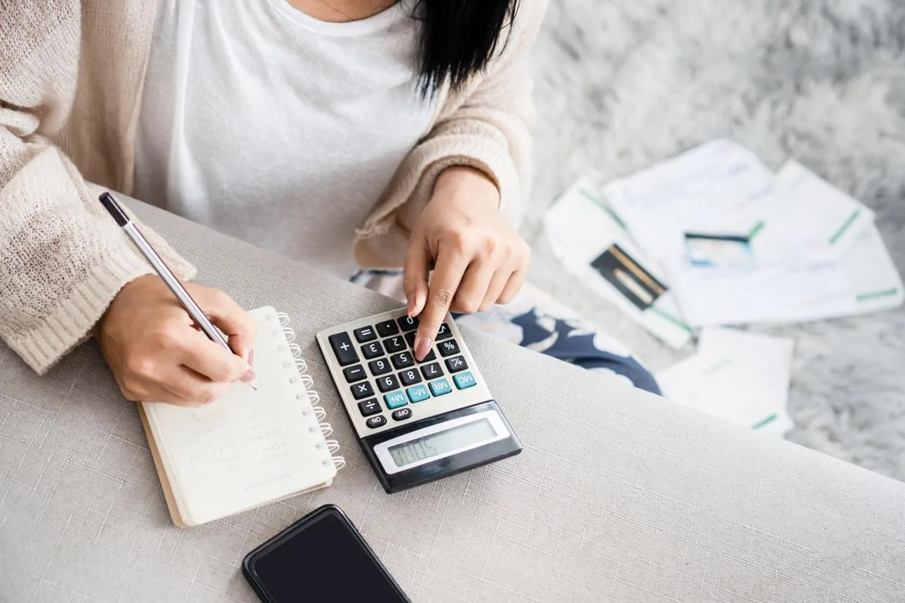 Close-up of a household budget planner and calculator